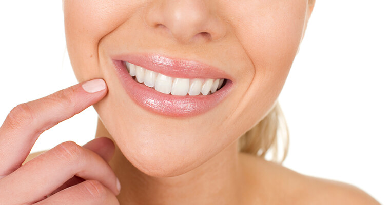 A female smiles closeup